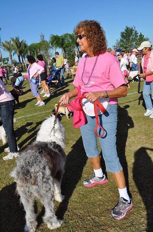 Sharon Carlson couldn't quite get her dog Dudley to join her in the warm up routine.