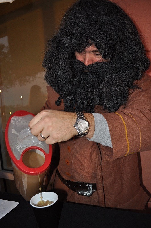 Hagrid, also known as Tyler Allwood, poured butter beer.