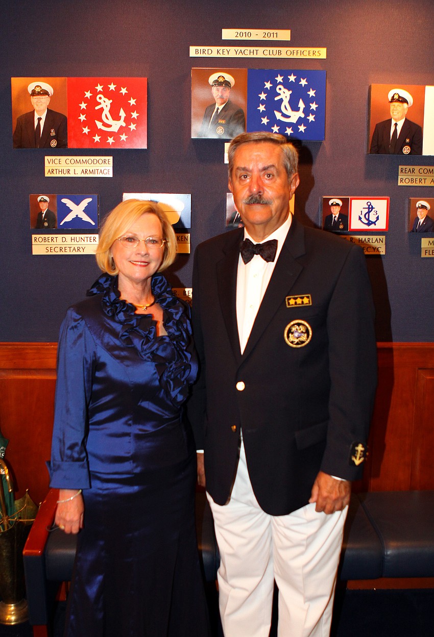 Commodore Louis Sanandres and Barbara Sanandres pose together in the foyer of the Bird Key Yacht Club.