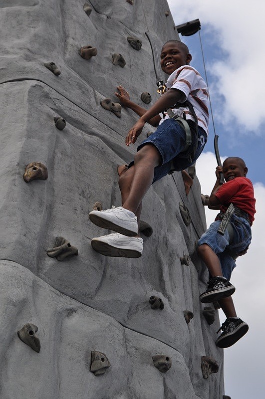 Oqu'zon Bellamy-Bey, 10, climbed alongside his 5-year-old brother Charlie Harris, not pictured.
