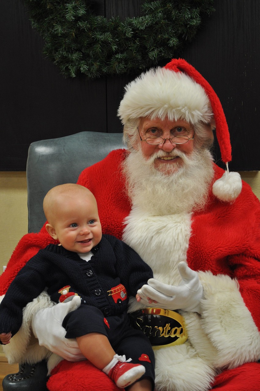 Lucas Olenec loves visiting with Santa.
