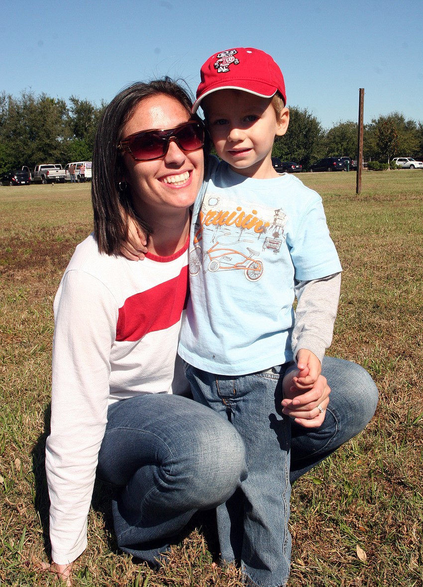 Jessica Long spent the afternoon going from bounce house to bounce house with her son Caleb, 2.