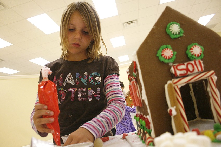 Olivia Conelias worked hard on her family's house.