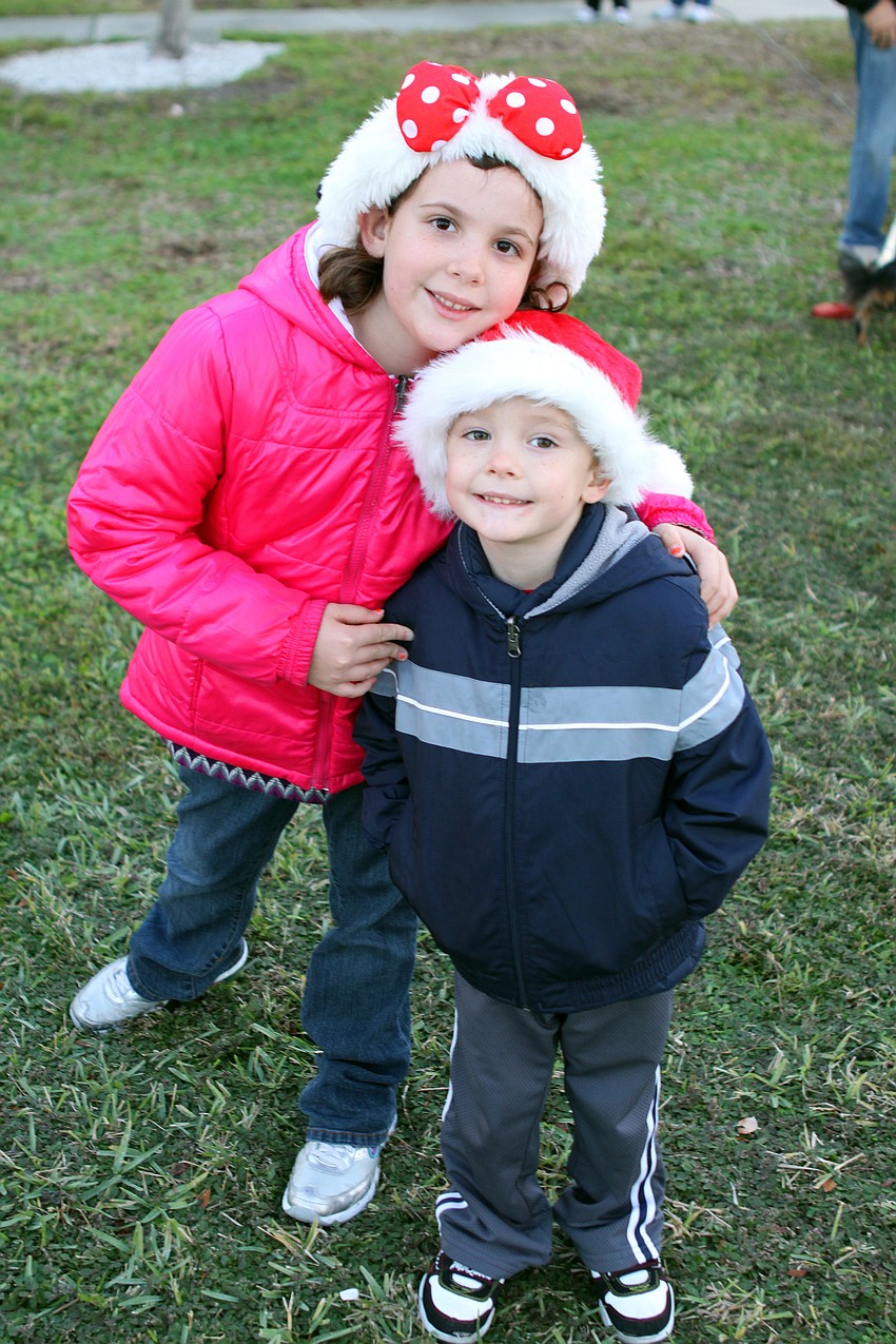 Jaelyn and Will pose together at Bayfront Park prior to the start of the Holiday Boat Parade on Saturday, Dec. 11.