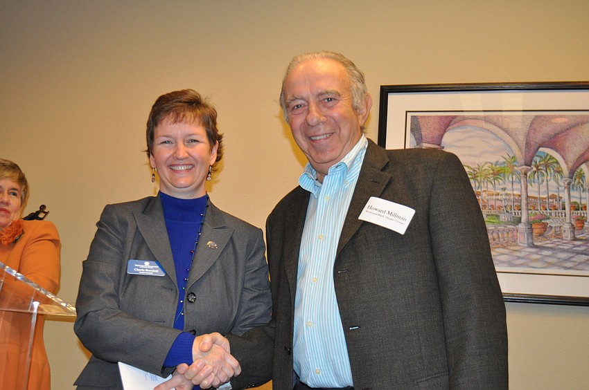 Charla Burchett and grant recipient Howard Millman with the West Coast Black Theatre Troupe