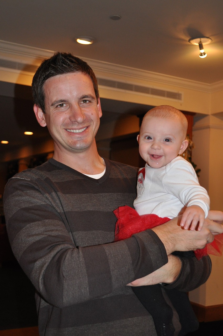 5-month-old Lucia Ellis was all smiles with her father, Chris.