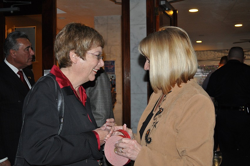 Nora Patterson and St. Armands Circle Association president Diana Corrigan say hello.