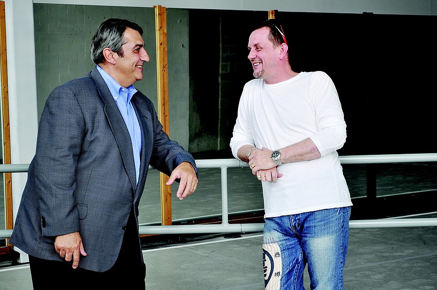 John Simon, of Pineapple Square Development, talks with Sarasota Ballet Director Iain Webb in September at the Pineapple Square studio Simon offered to the Sarasota Ballet for use during its 20th anniversary season.