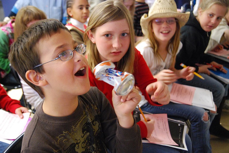 Right: The crushed can amazed student Connor Darpino.