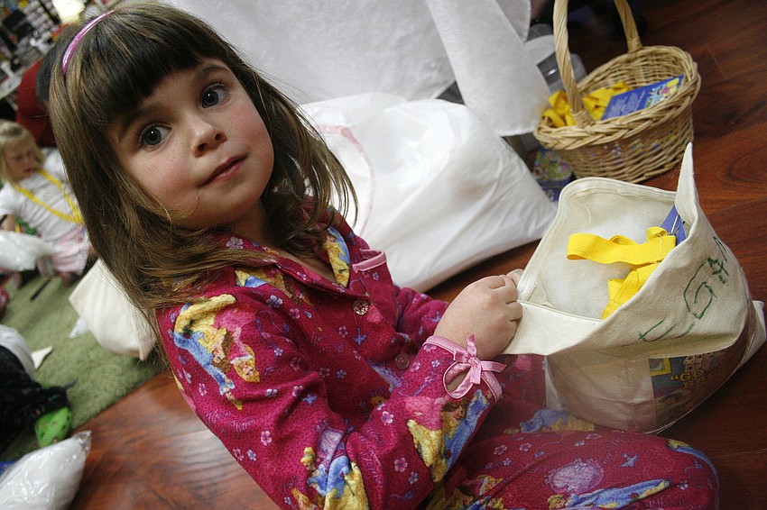Megan Bovaird, 5, had a blast making her own pillow at the Little Bookworms Pajama Party.