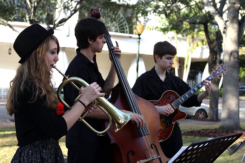 Members of the Pine View Jazz Combo, Bit Risner, Reed Tucker and Mac Gray, play some jazz music prior to the start of the Intersections Kickoff Celebration on Thursday, Jan. 20 at Selby Five Points Park.