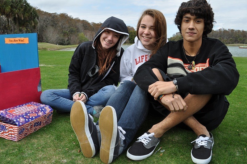 Braden River High's Desiree Brigham, Kristyn Klefenz and Kevin Parra worked a tic-tac-toe game.