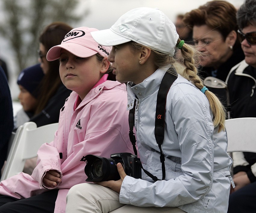 Ellie Wheian, 12, and Alisa Kulikova, 13, enjoyed meeting their favorite golfer.
