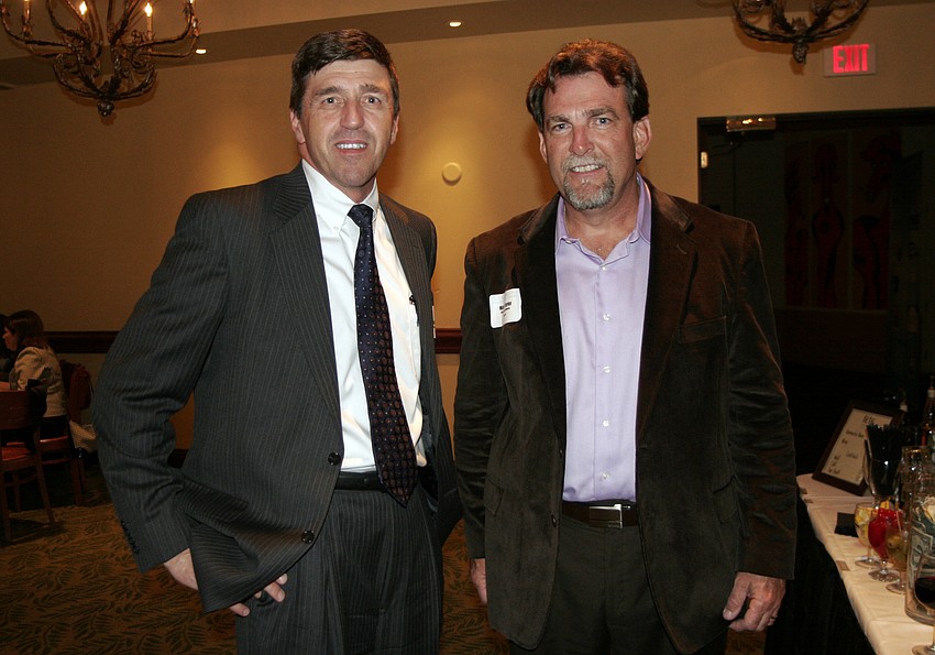 Kevin DiLallo of Manatee Memorial Hospital and Mark Burke of Bright House Networks