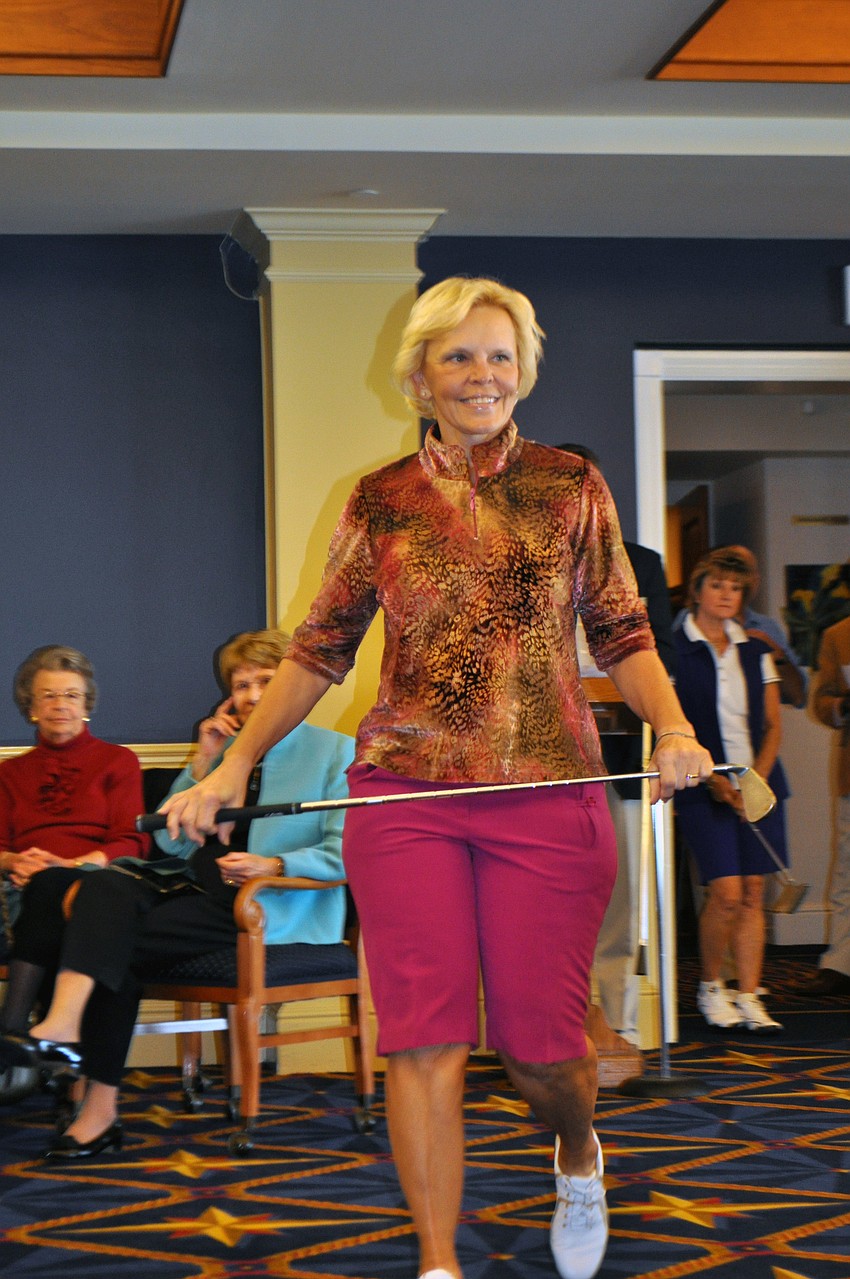 Jacqueline Bouma models a colorful golfing ensemble.