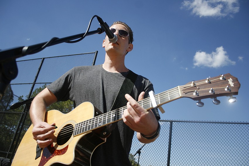 Joel Fisher performed music throughout the afternoon with his band.