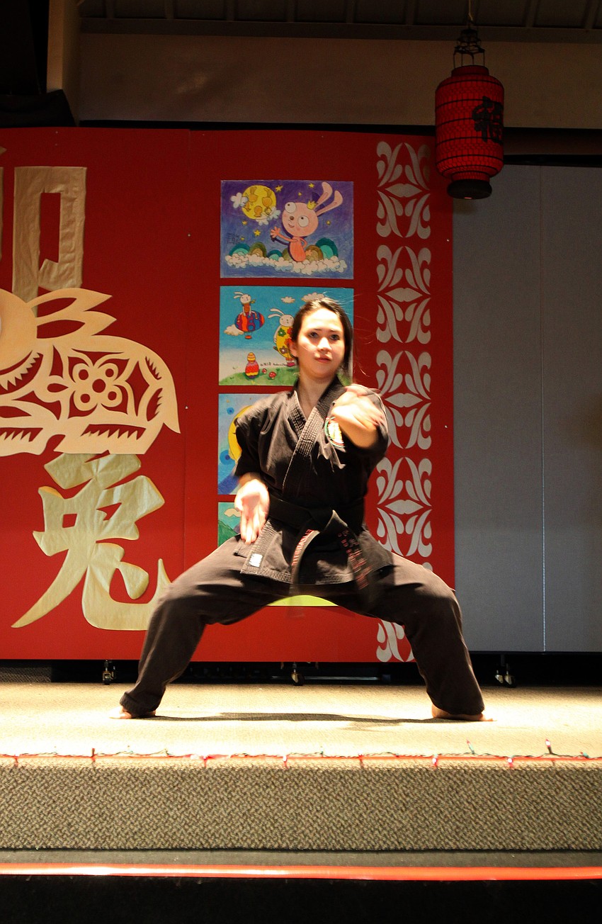 Elizabeth Lee shows off some of her martial arts skills during a demostration by the Ming Wu Martial Arts students on Saturday, Jan. 29 at the 2011 GCAA Chinese New Year Celebration held at T.J. Johnson Youth Center.