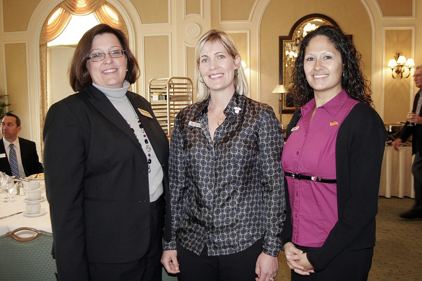 LWRBA Chairman of the Board Bobbi Larson and Shelly McAvoy and Natalia Dunnett of Cooper Creek Dental.