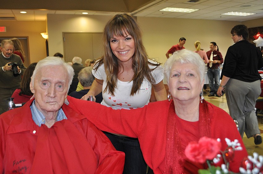 YPG member Erika Wise visits with Francis and Virginia McQuaig.