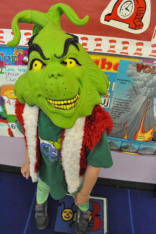 Ethan Traeger, 5, said he came as Mr. Grinch 'because I like him.