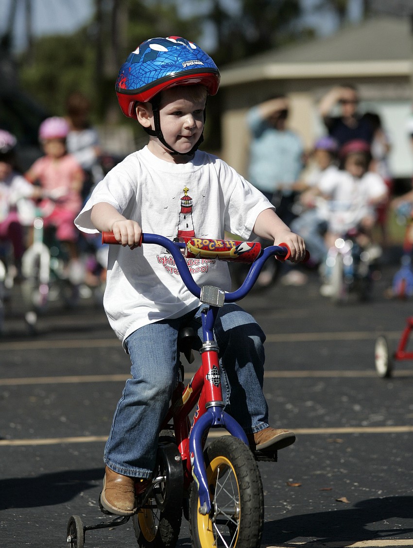 Lane Polson, 3, didn't stop peddling.