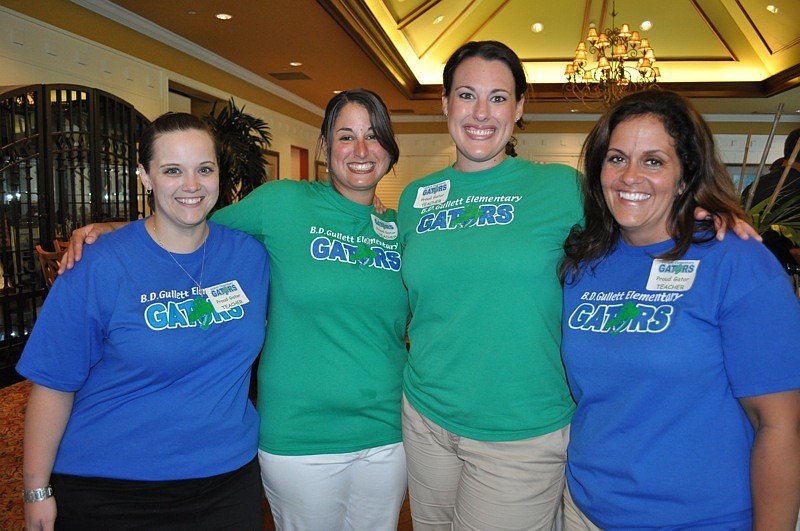 Teachers Katie Folds, Jakie Stark, Jennifer McGloin and Rhonda Turner enjoyed golfing.