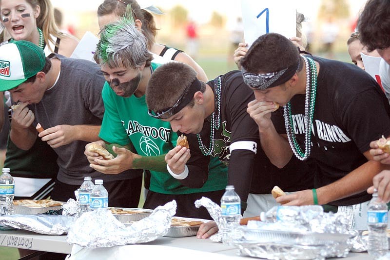 Several students competed in a hot dog-eating contest prior to kickoff.