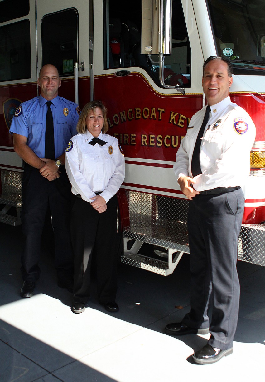 Lt. Haas, DC Drake and fire chief Dezzi.