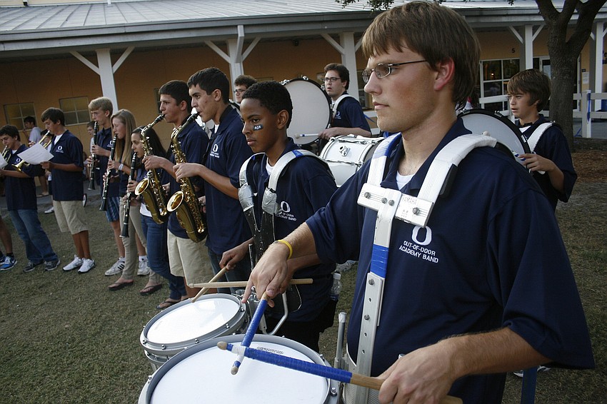 The band performed the school fight song before leading fans to Thunder Stadium.