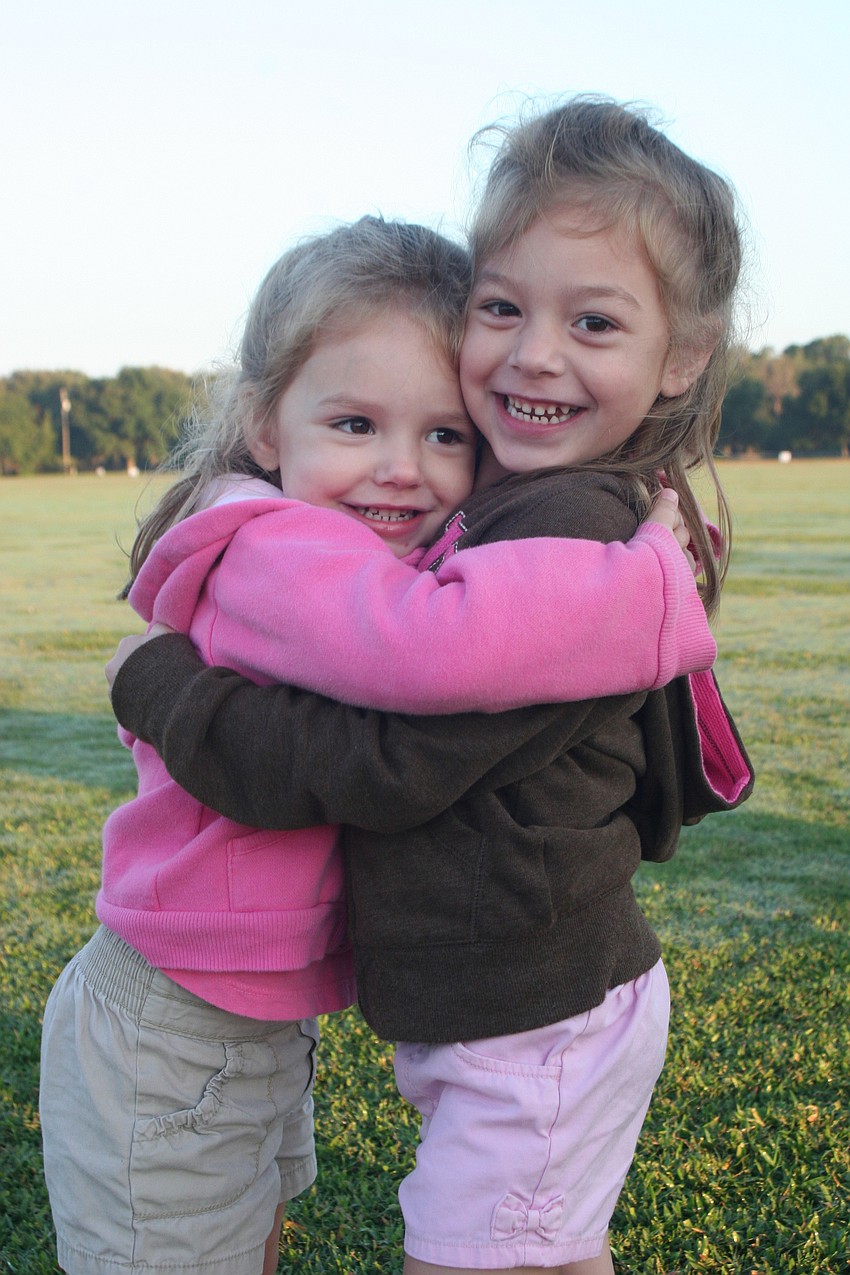 Three-year-old Zoey Selby and her sister, Avalon, 5, couldn't wait to start walking.