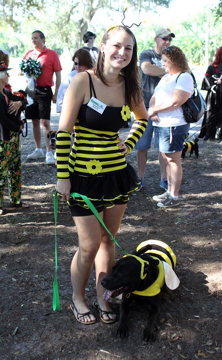 Kasey Gerdeman and Moe, 3-year-old lab mix, won for Dog and Owner Look-A-Like.