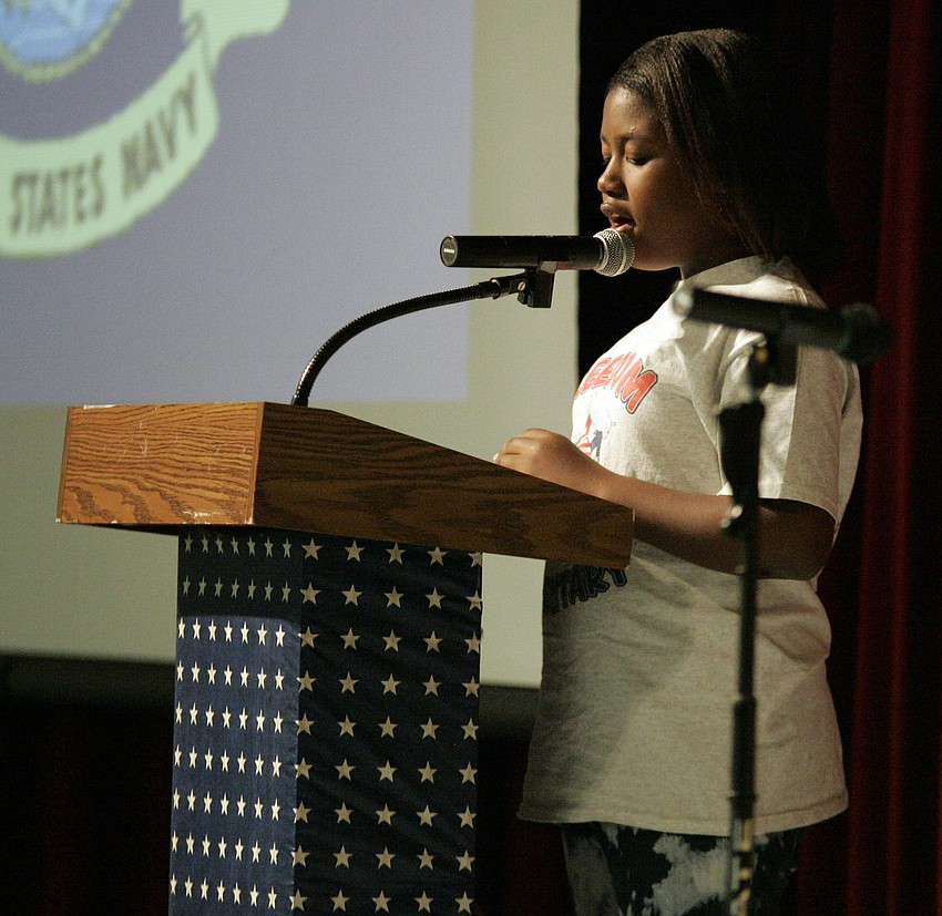 Fourth-grader Kiana Love discussed the Navy flag.
