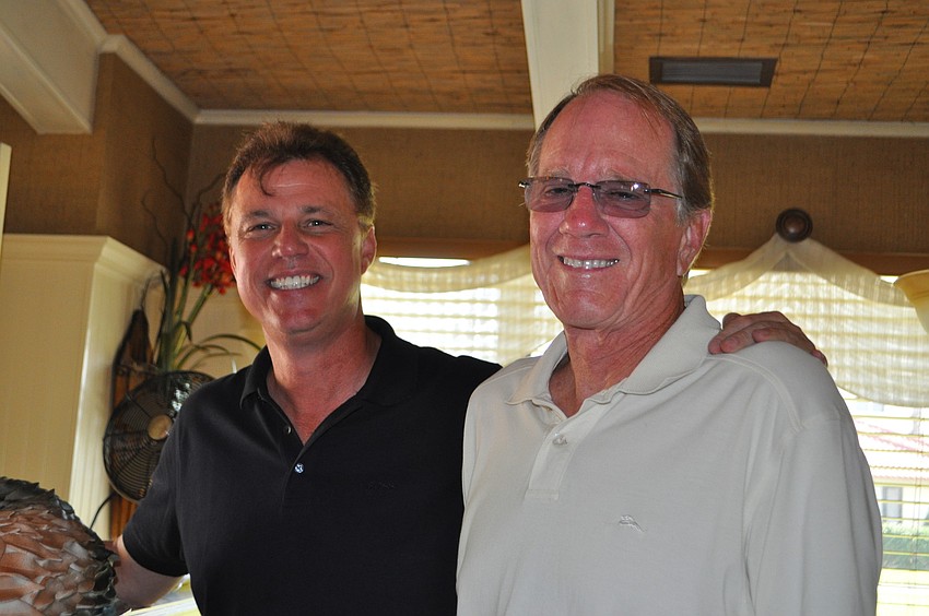 Host Ken Bennett and Pelican Harbor resident Phil Smith.