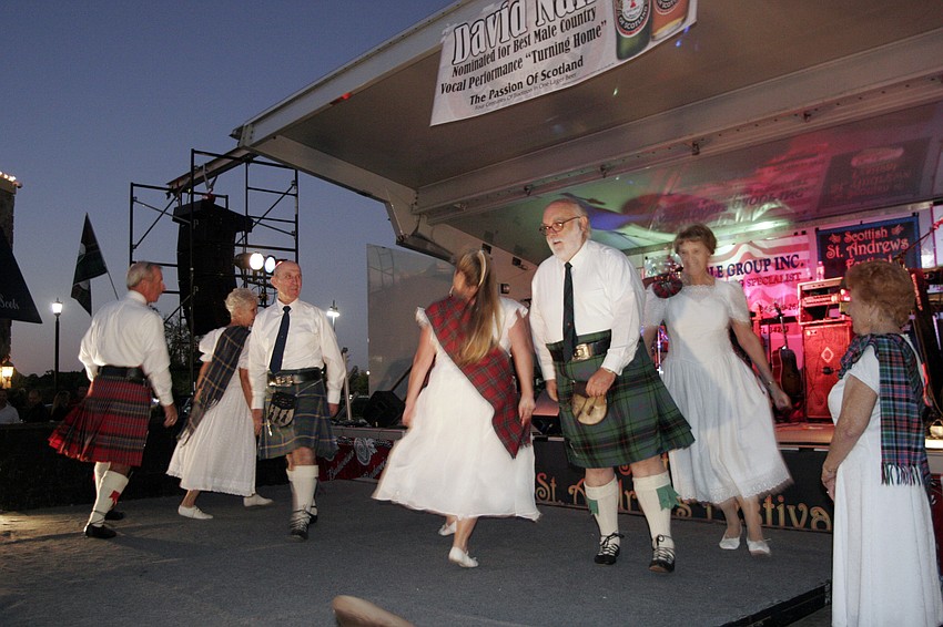Members of the Sarasota Scottish Country Dancers perform traditional Scottish dances.