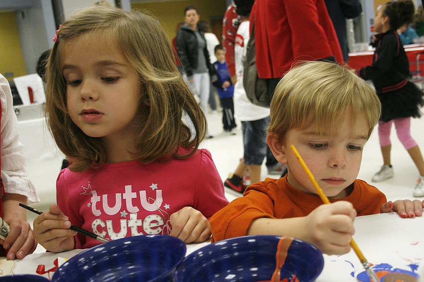 Madison and Jaxson Vassallo worked hard on their Christmas crafts.