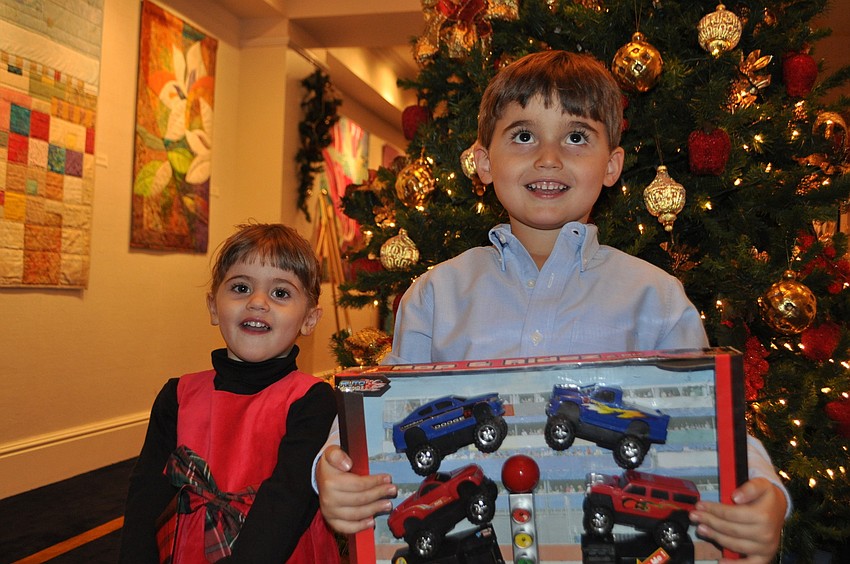 Lisa and Louie Massaro show what Santa brought them.