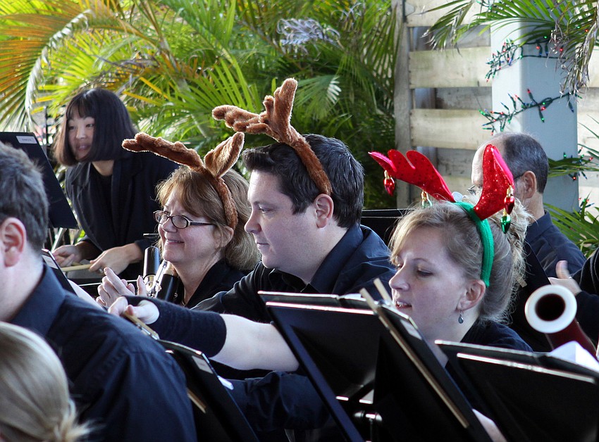 Some members of the Sarasota Orchestra donned reindeer antlers while the played at Mote on Tuesday, Dec. 21.
