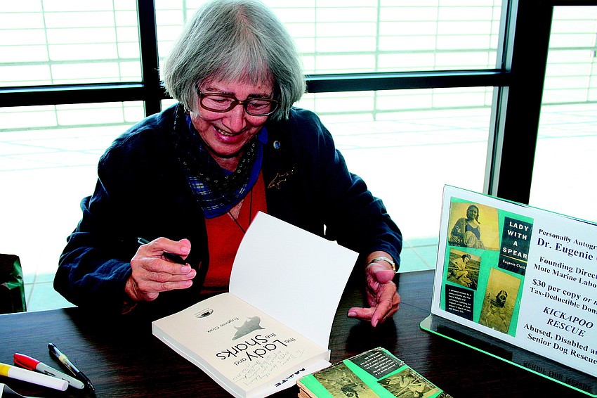Dr. Eugenie Clark autographed a copy of the new edition of her book, 