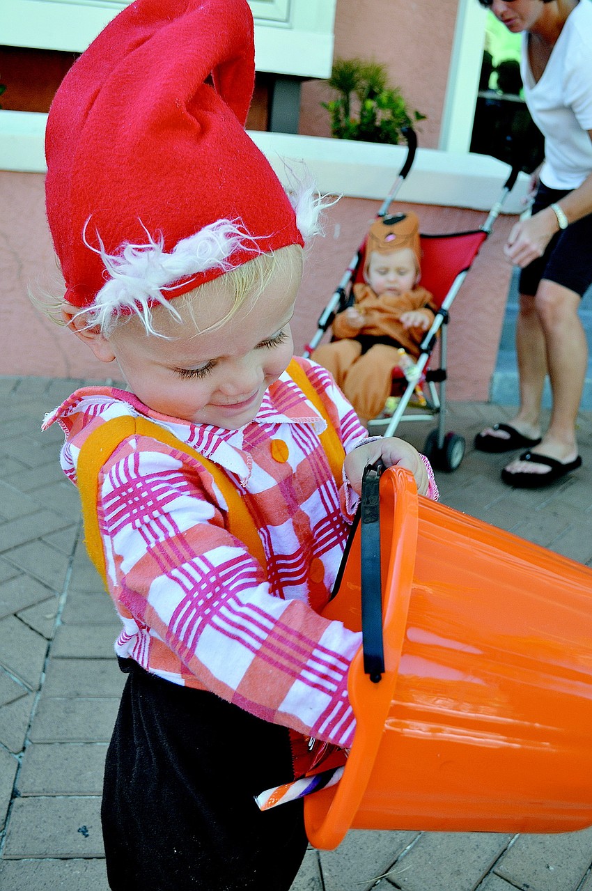 James Riddiford couldn't wait to dig into his loot at in October at Siesta Key Village Association's 