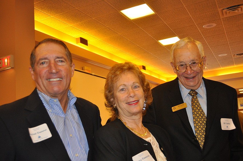 Rabbi Michael and Nancy Eisenstat with Temple Vice President Bill Sandy