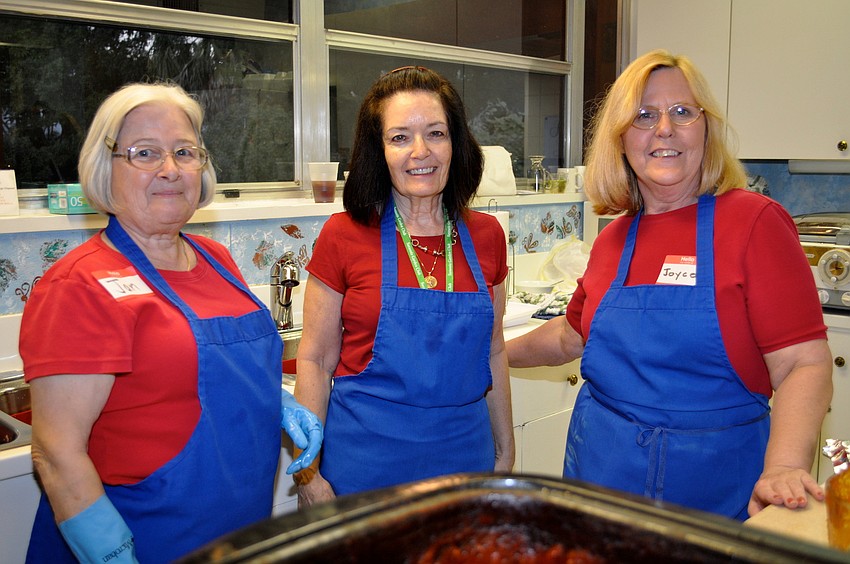 Jan Johannesen, Garden Club President Ginger Vance and Joyce Peavey man the dirty dishes.