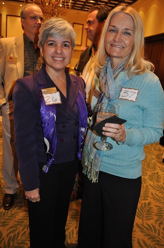 Marie Avery of Re/Max Alliance Group and Debbie Lamb, owner of Signs Now, were eager to get started.