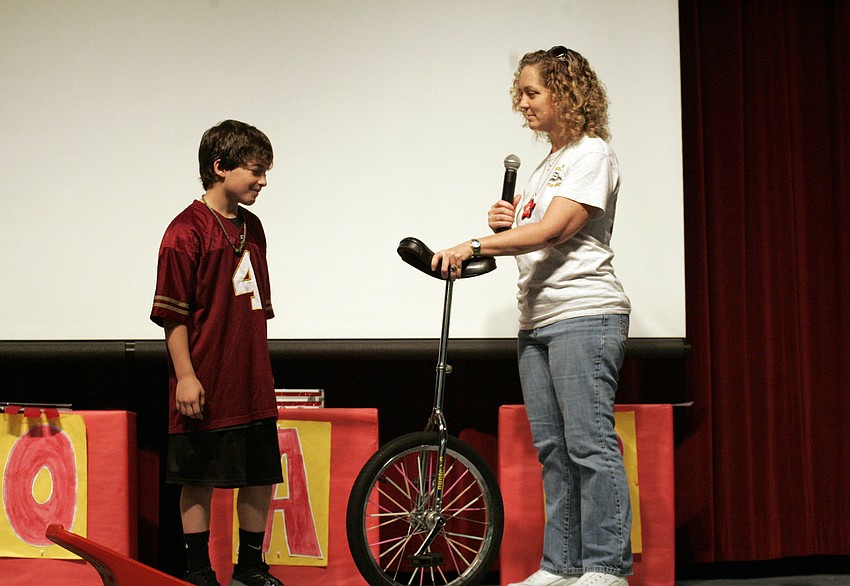 Fifth-grader Mason Fischer wasn't all that eager to try out the unicycle.