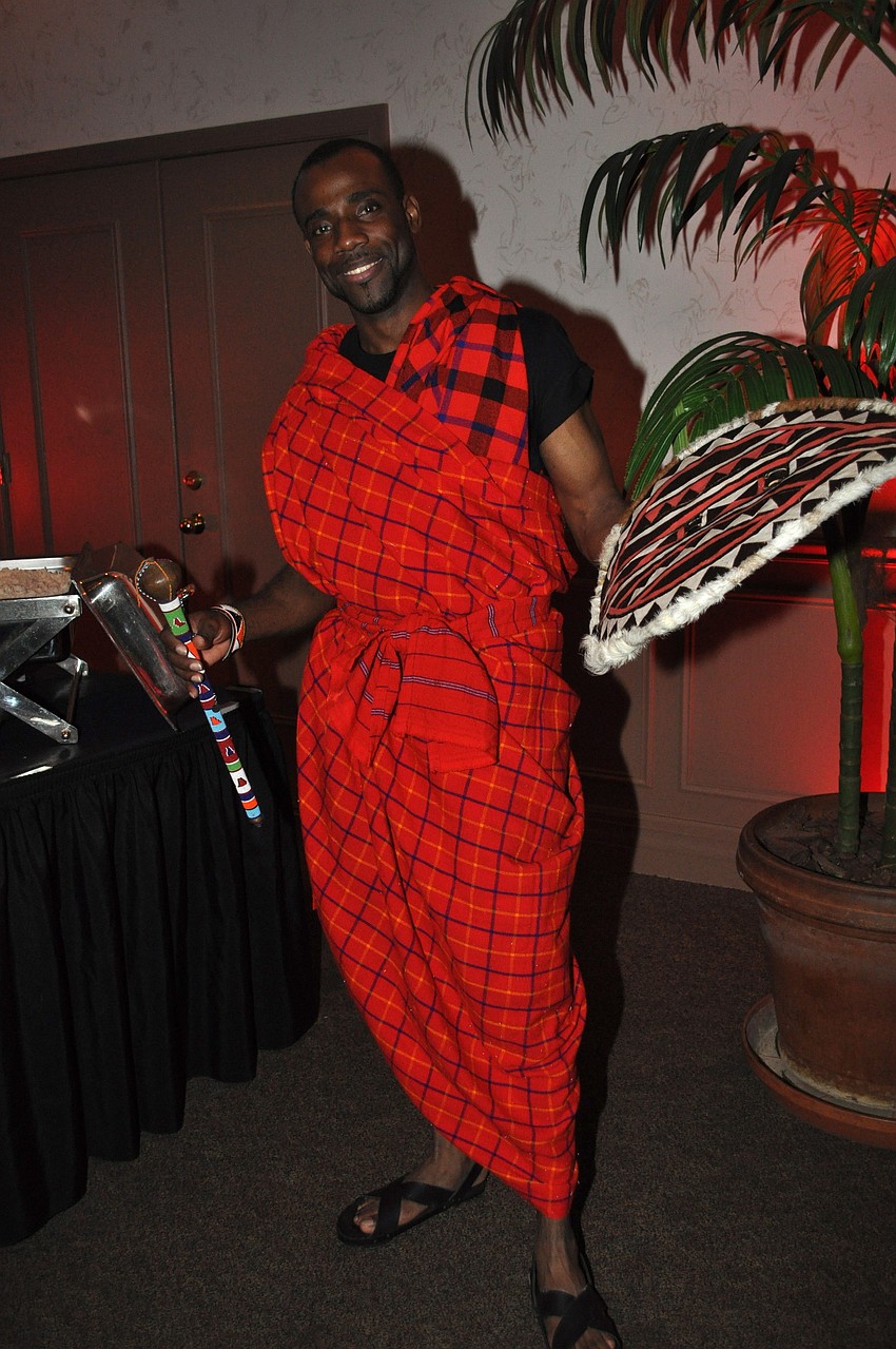 Jason Morely shows off his warrior weapons.