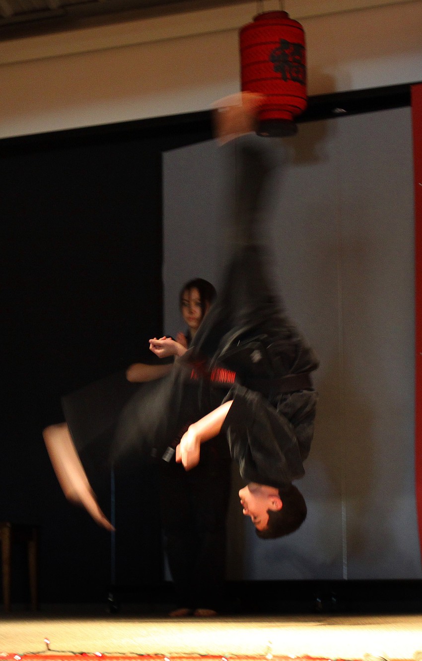 Brandon Ramirez does a flip during the Ming Wu Martial Arts performance on Saturday, Jan. 29 at the 2011 GCAA Chinese New Year Celebration held at T.J. Johnson Youth Center.