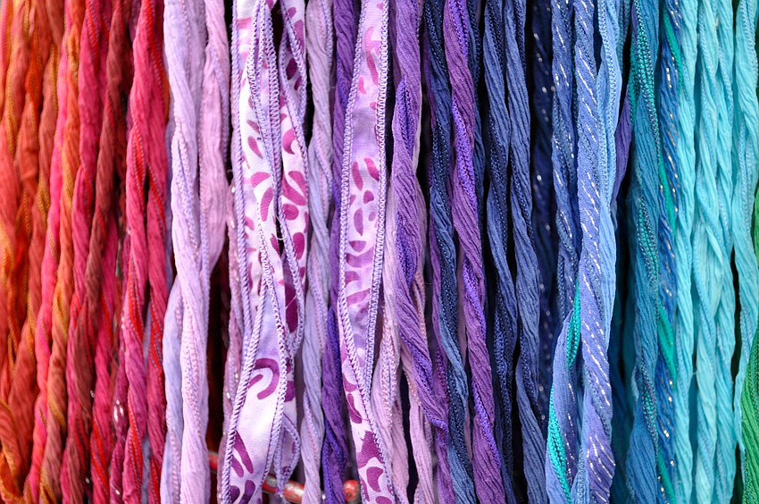Hand-dyed silks were displayed at Beth Collette's booth.