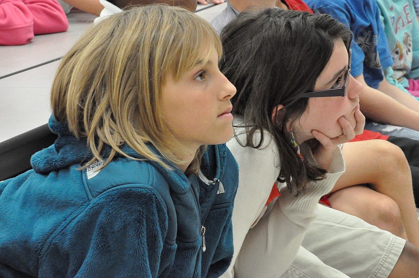 Claudia Sbaschnik and Grace Sever were intent on the presentation.