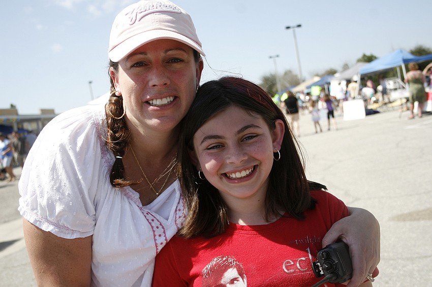 Alyssa Squitieri, right, had a great time at the carnival her mother, McNeal PTO President Nicole Squitieri, helped organize.