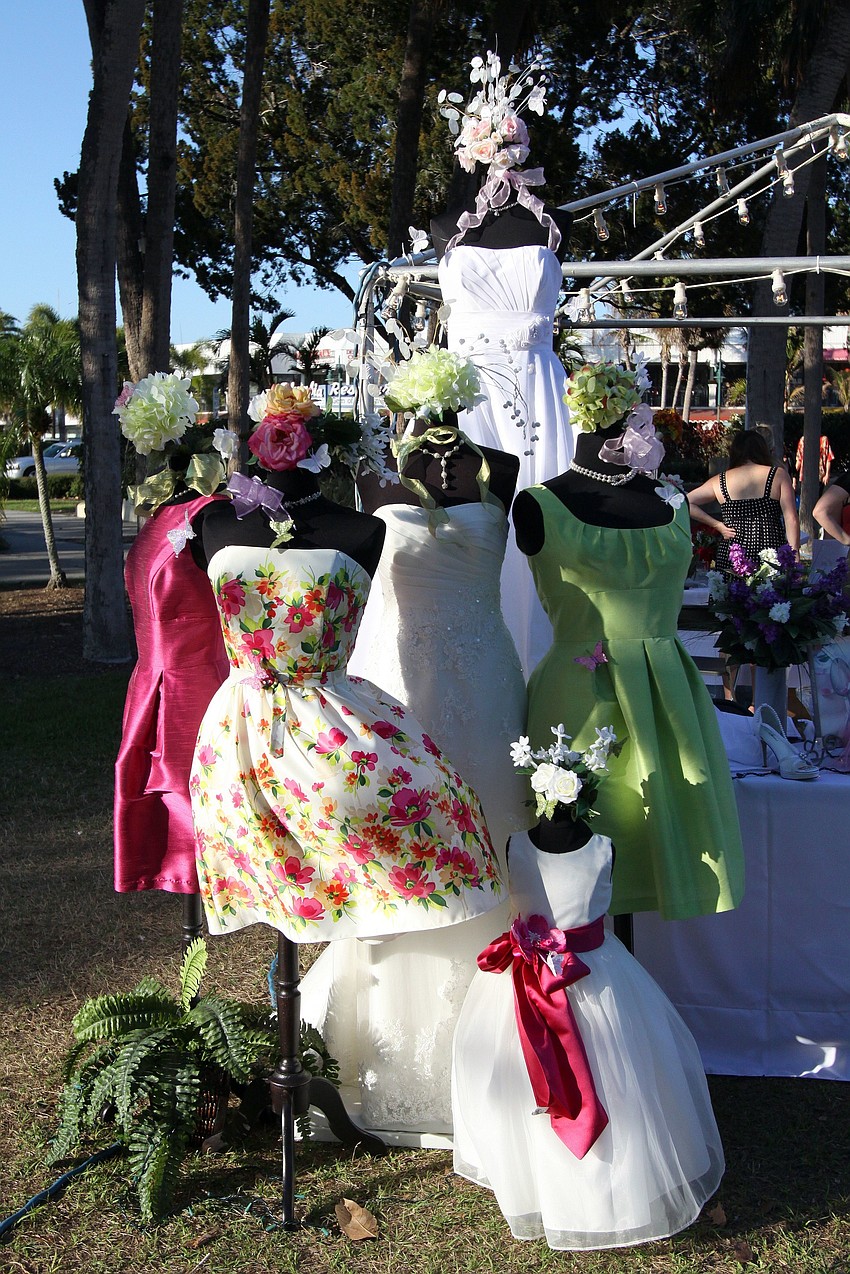 A display of dresses from Sarasota Brides and Formal Wear.