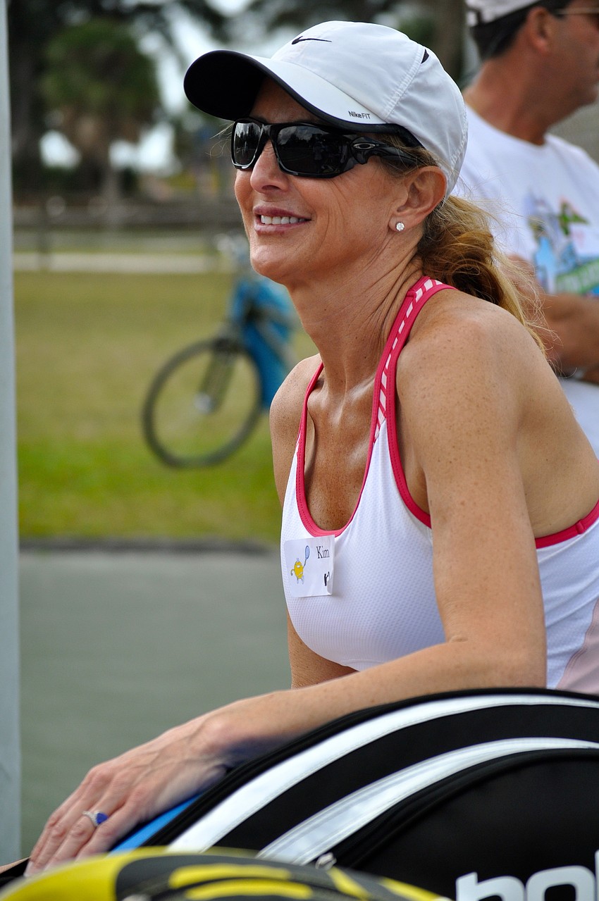 Kim Cherry watches the match.